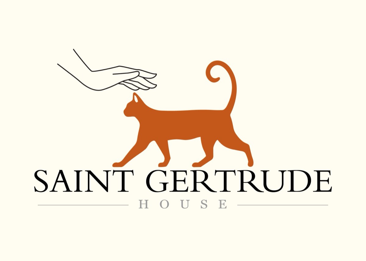The Saint Gertrude House imprint mark: a walking cat reaching toward an outstretched hand, in burnt orange beneath didone capitals.