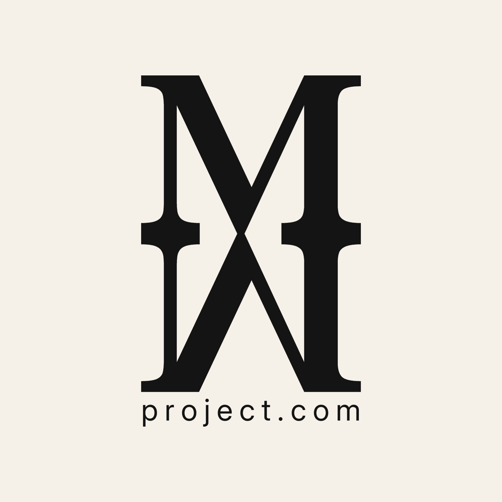 The Mini Museum monogram in a pale box, its interlocking capitals reading as mm above the address project.com.